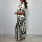 Elegante completo stampato da donna composto da due pezzi: top con scollo a V e pantaloni