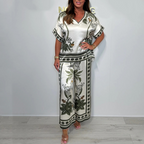 Elegante completo stampato da donna composto da due pezzi: top con scollo a V e pantaloni