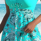 Top con fasce e comodi pantaloncini da bagno: badpak in tweed