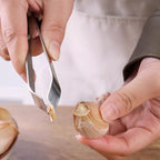 Hoogwaardige 304 roestvrijstalen knoflookpeler (tipo klem) per la cottura